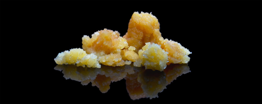 cannabis concentrate with high thc content on black background